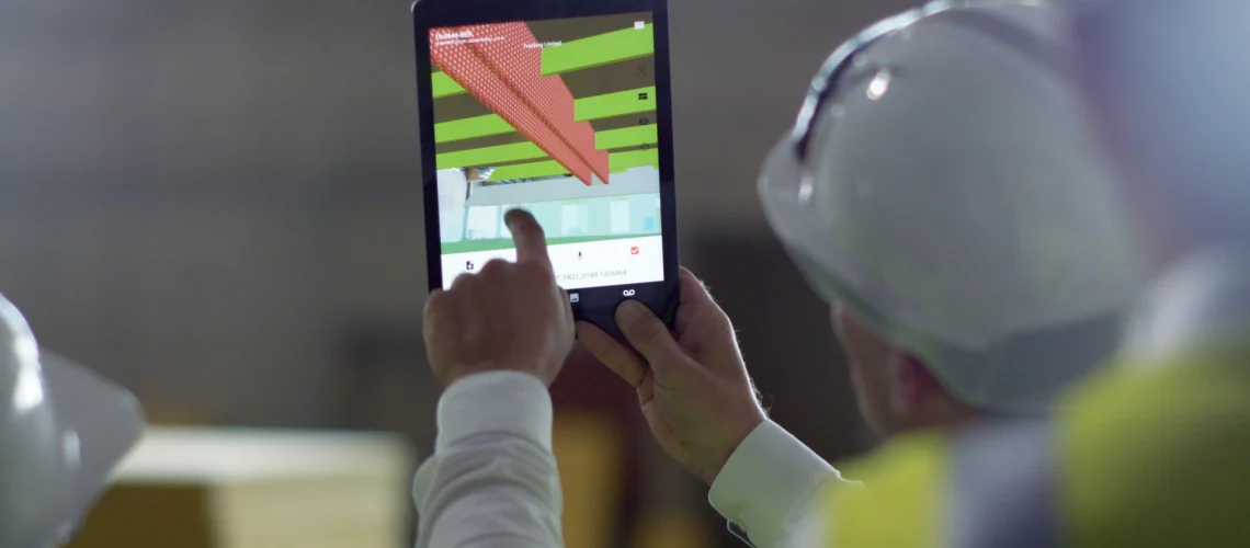 construction worker showing augmented reality for construction